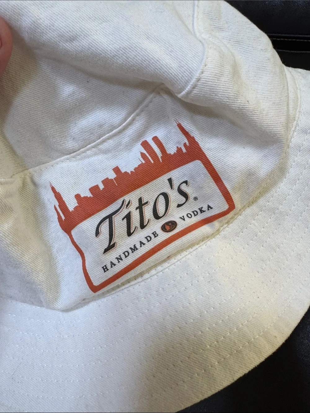 White unisex Bucket Hat with Orange Logo